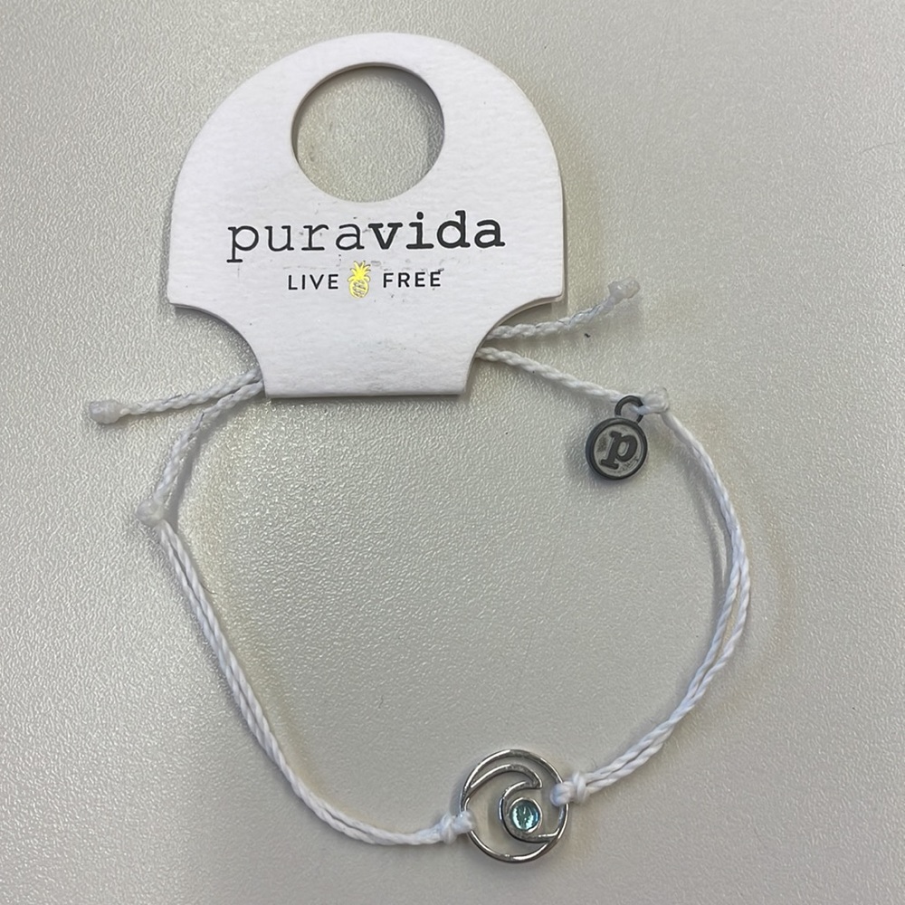 White pura vida gem brace - wave with blue gem 💎